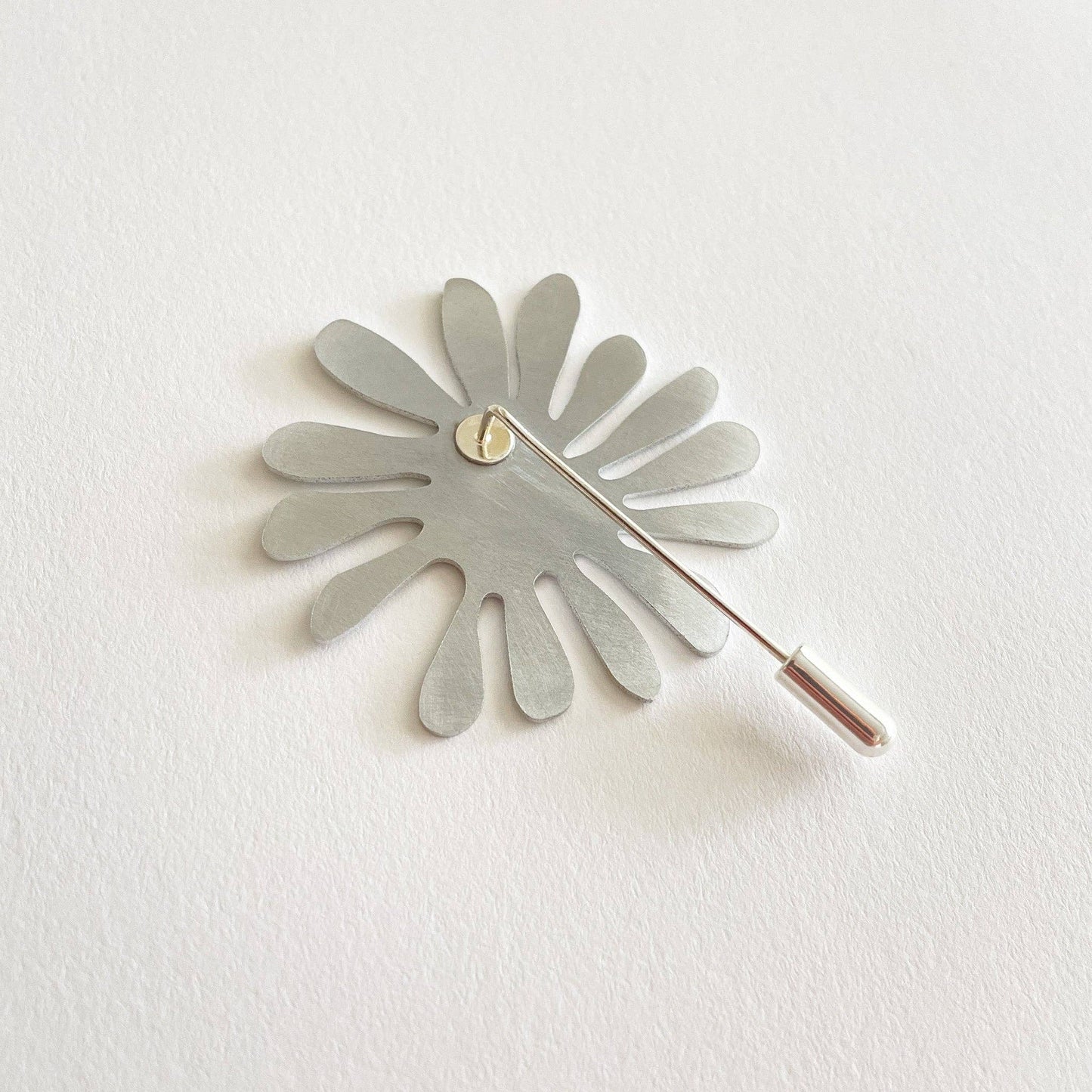 Tom Pigeon - Silver Aluminium Aster Pin